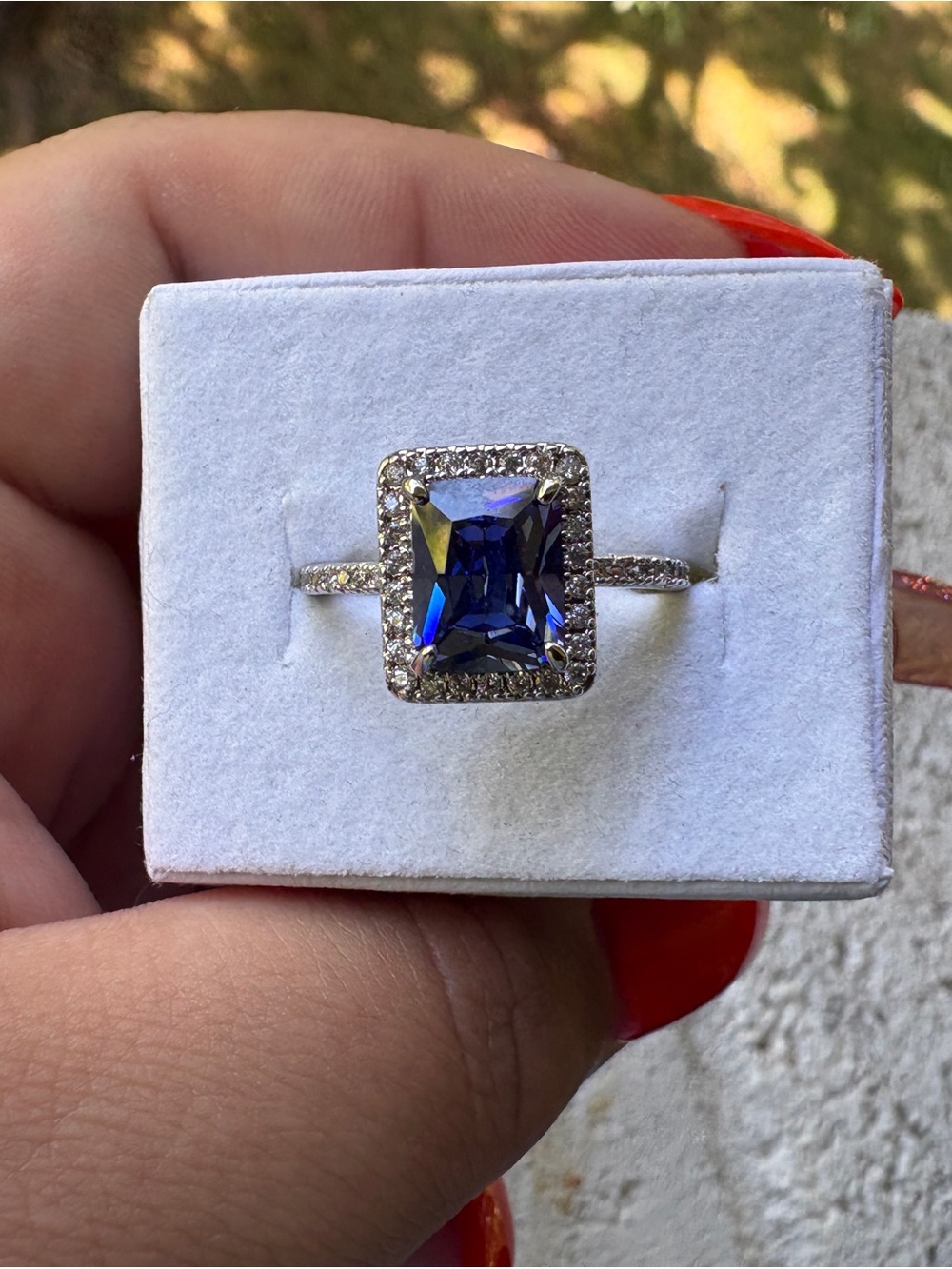 Blue Cushion-Cut Halo Ring with Silver Pavé Band